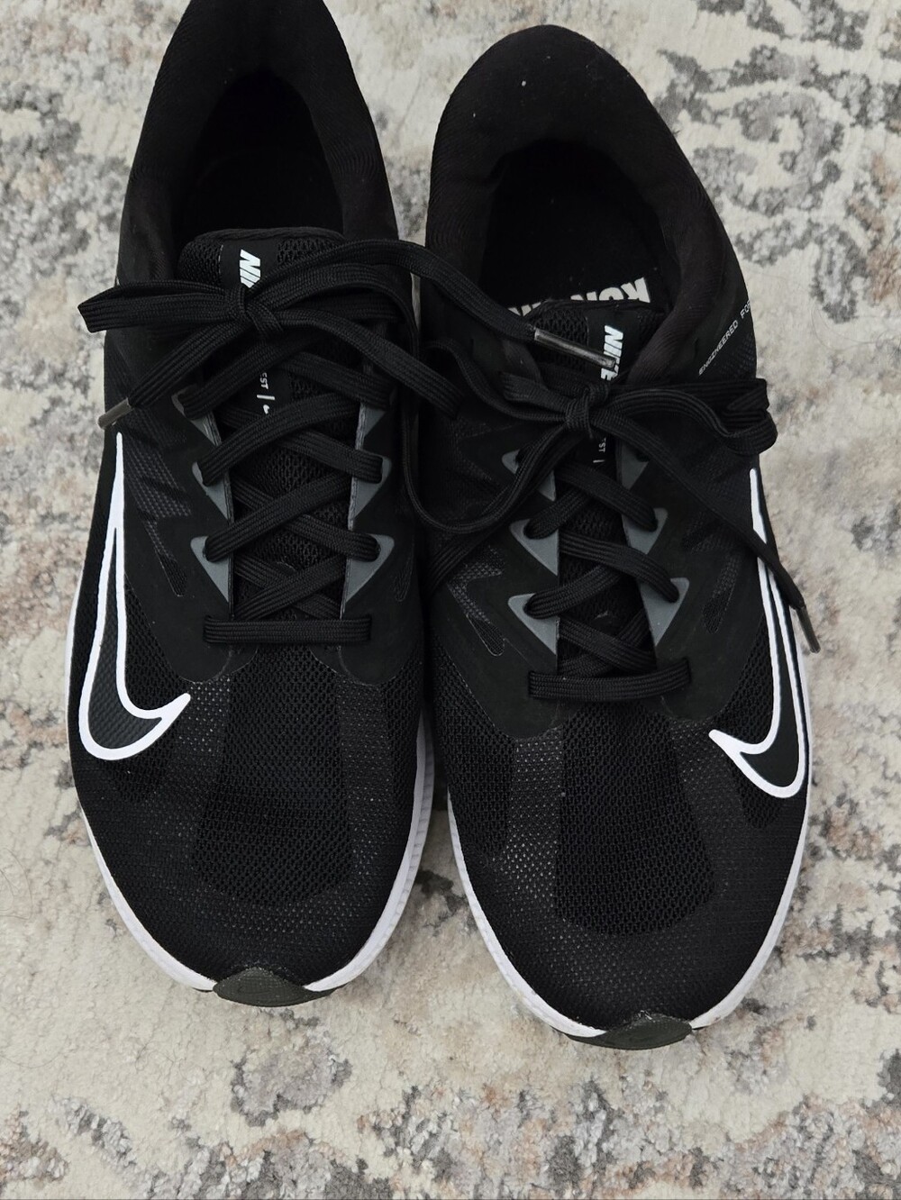 Nike Black Mesh Athletic Sneakers with White Swoosh